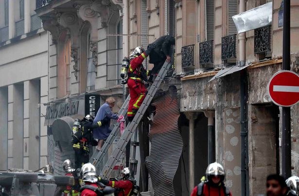 1 Firemen work at the site of an explosion in a bakery shop in the 9th District in Paris